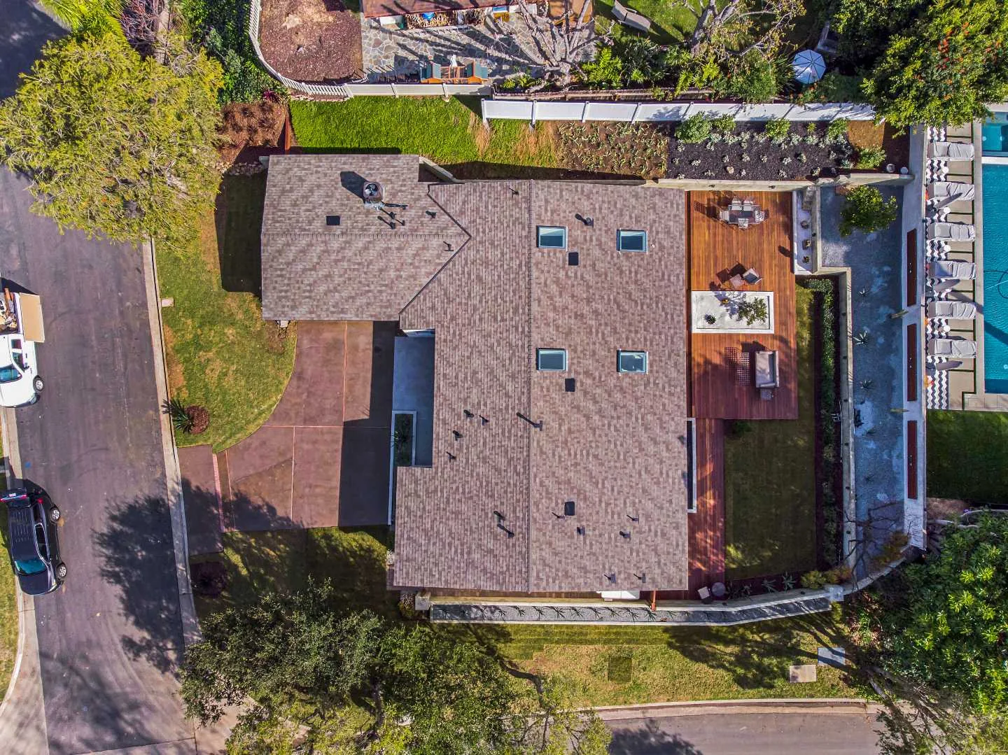 Full backyard remodel in Santa Monica by Amerbuild featuring custom patio, deck, and outdoor living space