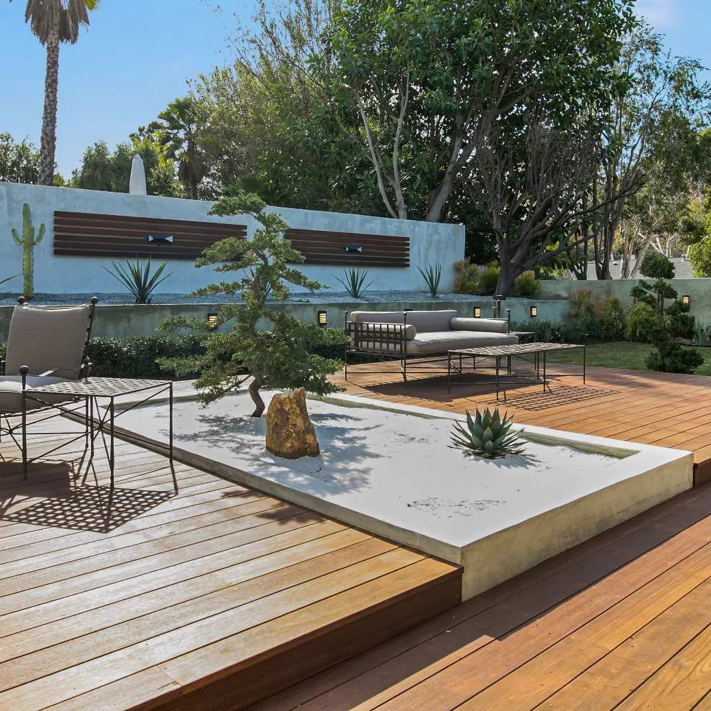 Custom outdoor living space featuring deck and patio designed and built by Amerbuild in Los Angeles